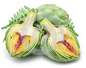 Green artichokes and artichoke heart isolated on white background