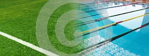 Green artificial football field and blue swimming pool tract banner background