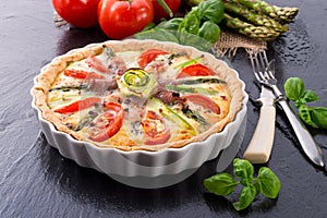 Green asparagi Tart with eggs and tomato