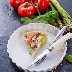 Green asparagi Tart with eggs and tomato