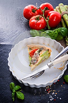 Green asparagi Tart with eggs and tomato