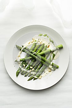 Green asparagus with hollands sauce. photo
