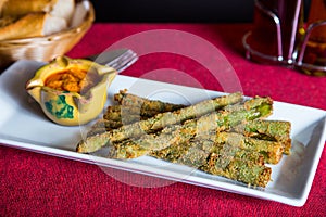 Green asparagus in tempura. Traditional Spanish tapa.