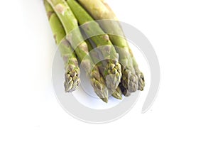 Green Asparagus Vegetable on white wood background