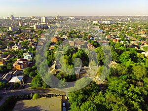 Green autumn Rostov-on-Don cityscape, aerial view of city skyline and forest with green trees , Rostov-na-Donu, Russia photo