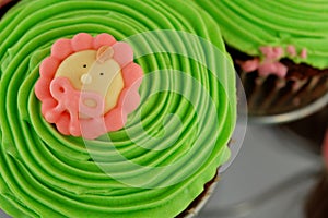 Green baby icing cupcake