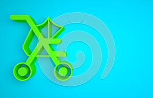 Green Baby stroller icon isolated on blue background. Baby carriage, buggy, pram, stroller, wheel. Minimalism concept