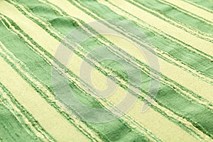 Green background luxury cloth or wavy folds of grunge silk texture satin velvet