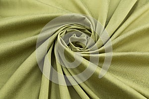 Green background luxury cloth or wavy folds of grunge silk texture satin velvet