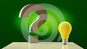 green background , question mark and light bulb