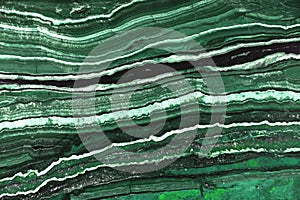 Green background with a stone structure with stripes Onice Fantastico photo