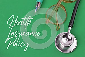 Green background written with text HEALTH INSURANCE POLICY