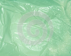 Green bag of wrinkled plastic