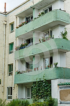 Green balconies with flowers. Kaesong, North Korea