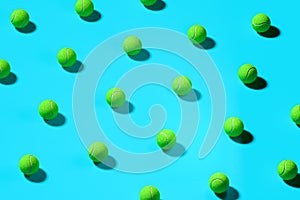 Green Baseball Balls Isolated On Blue Background. 3d Rendering