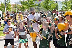 Green Bay Packer Player Signing Autograph for Young Fan