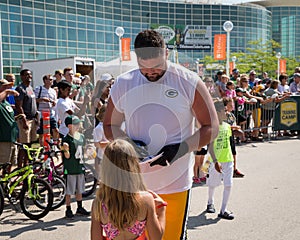 Green Bay Packer Player Signing Autograph for Young Fan