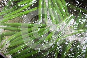Green beans cooking in boiling water