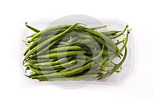 Green beans packaged in plastic isolated