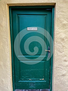 Green beautiful door in Tenerife, Spain. External wooden door. Privado main private photo