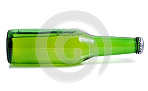 Green beer bottle in a horizontal position