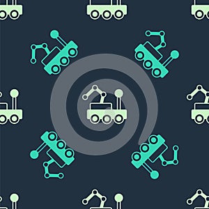 Green and beige Mars rover icon isolated seamless pattern on blue background. Space rover. Moonwalker sign. Apparatus