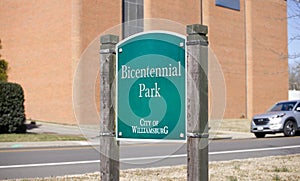 A Green Bicentennial Park Sign in Williamsburg, Virginia photo