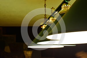 Green billiard lamp close up