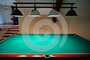 Green billiard table in private apartment