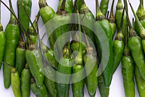 Green Bird`s eye chili ,Thai Chili pepper ,bird chili pepper nature isolate on white background.