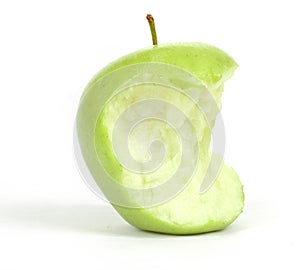 Green bitten apple on white