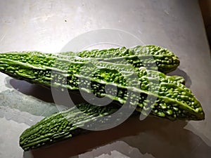 Green bitter gourd natural food fresh white backgroun.