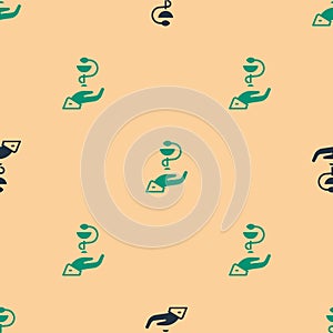 Green and black Caduceus snake medical symbol icon isolated seamless pattern on beige background. Medicine and health