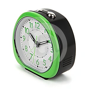 Green and black clock isolated on white background