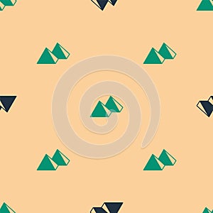 Green and black Egypt pyramids icon isolated seamless pattern on beige background. Symbol of ancient Egypt. Vector