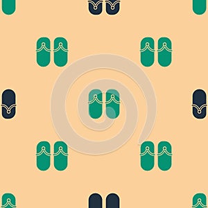 Green and black Flip flops icon isolated seamless pattern on beige background. Beach slippers sign. Vector Illustration