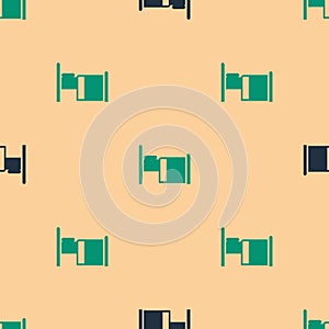 Green and black Hospital bed icon isolated seamless pattern on beige background. Vector