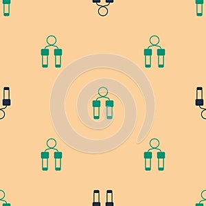 Green and black Jump rope icon isolated seamless pattern on beige background. Skipping rope. Sport equipment. Vector