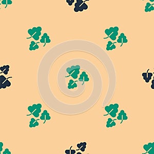 Green and black Oak leaf icon isolated seamless pattern on beige background. Vector