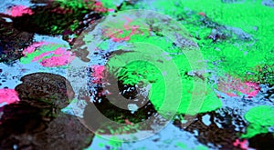 Green black phosphorescent pink painting spots abstract background photo