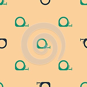 Green and black Roulette construction icon isolated seamless pattern on beige background. Tape measure symbol. Vector