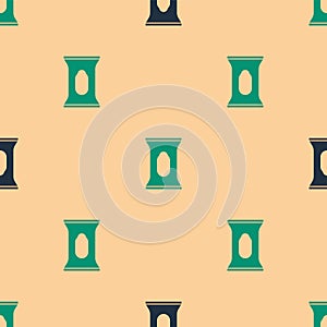 Green and black Wet wipe pack icon isolated seamless pattern on beige background. Vector