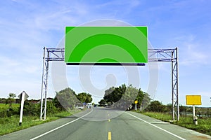 Green Blank road sign on highway road,copy space for your text.