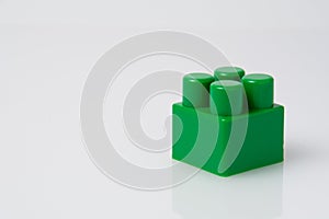 Green block constructor on white background. Construction idea concept