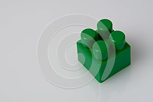 Green block constructor on white background. Construction idea concept