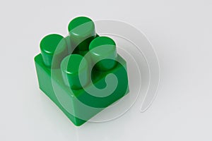 Green block constructor on white background. Construction idea concept