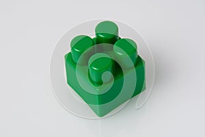 Green block constructor on white background. Construction idea concept