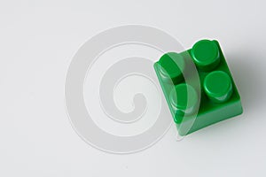Green block constructor on white background. Construction idea concept