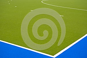 Green and blue artificial turf sports field