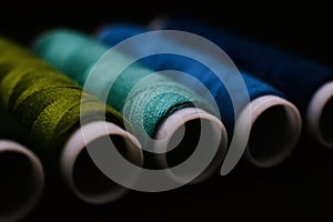 green and blue colored threads background